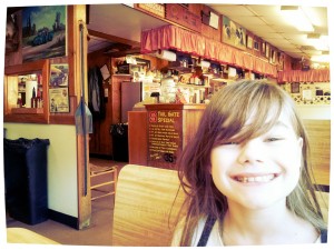 Mini Maven getting ready to tear into some ribs, fried okra, & hush puppies! Raisin' another foodie...