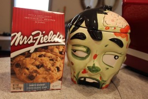 A zombie cookie jar! My DH loves zombies AND cookies! When we first met, I used to make him homemade cookies (& truffles) all of the time. I could easily collect cookie jars, but I can't allow myself one more collection (especially in the kitchen). I already have trouble with salt & pepper shakers, which only got worse after publishing my second book, Don't Rub Salt in the Heartbreak. Now other people give them to me as well!