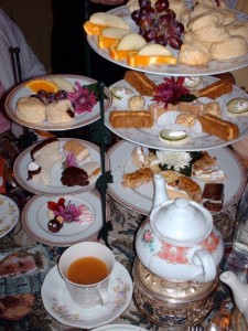 A photo of our typical Mad Hatter's Tea Party with petit fours, tea, and lemon curd aplenty!