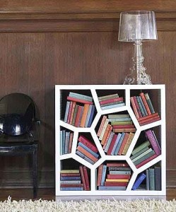 This is one of the simpler ideas, especially for paperbacks. I was thinking  certain shoe racks could store books quite well, in this mishmash sort of way. It would be a really swell idea for a child's bathroom while potty-training.