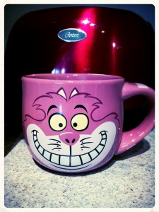 My VERY favorite cartoon character is Cheshire Cat! #purrrrr This mug is so colossal that I like to drink more than decaf out of it ~ I like to eat soup, cereal & ice cream out of it, too. He's a versatile pussycat. :) This was originally from the Disney Store, but I don't believe they carry it anymore (since I've been carrying it around for over 15 years), but check out THIS cool *disappearing* Cheshire mug! Yes, check it out my sweets who love me galore. ::winkwink:: ::hinthint::